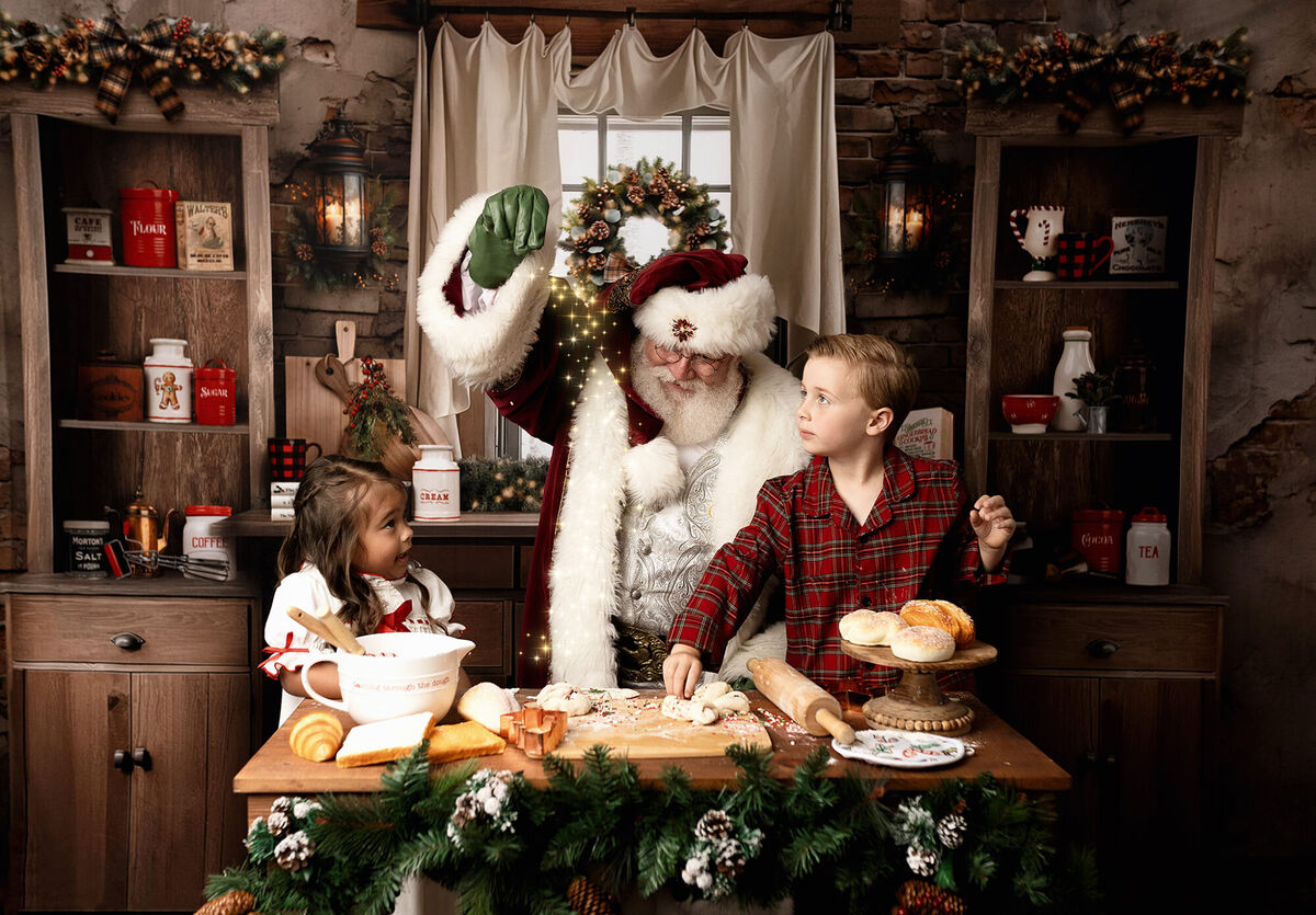 Santa Sarge baking with two children on a Christmas kitchen set